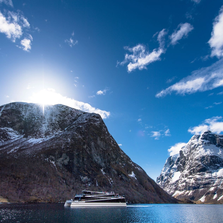 Electric boat trip along fjord with speakers and inspirational exchanges on board